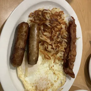 Bacon, sausage, hashbrowns, and eggs in the number three order.