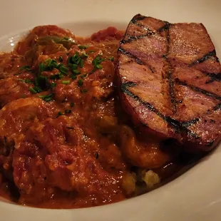 Shrimp n Grits with Tasso sauce and grilled Andouille added