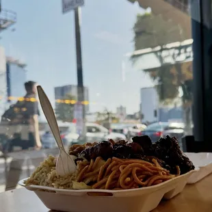 Big ol&apos; box o&apos; bbq and orange chicken, chow mein and fried rice ($11)