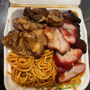 meat and noodles in a styrofoam container