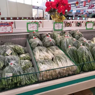 a variety of vegetables in baskets