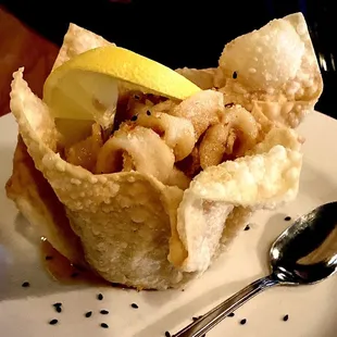 The Calamari served in it&apos;s own wonton shell was amazing!!!  Tender sweet succulent squid in a crispy shell.