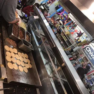 a man preparing food in a kitchen