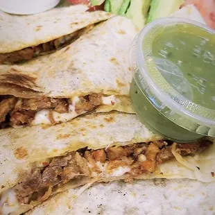Todays special, al pastor quesadilla, side salad with fresh avocado and a drink $6.99