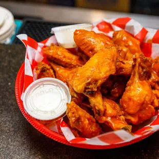 a basket of chicken wings