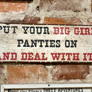 Keepin&apos; it real in this restaurant. One sign on the wall.