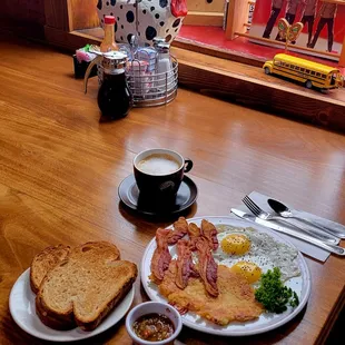 Basic Breakfast eggs any style, toast , hash browns and your choice of bacon or sausage.