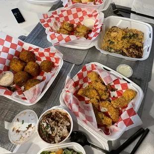 Boudin Balls, Cajun Eggrolls, RedFish, and fried Catfish