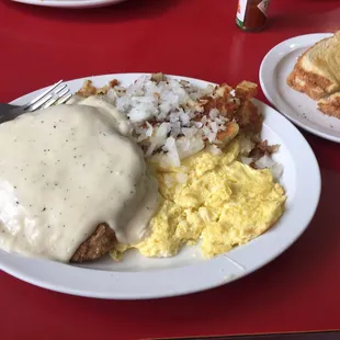 Chicken fried steak and eggs.