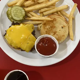 Kids mini cheese burger and fries.