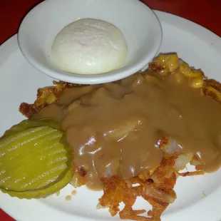 I keep craving these taters! Cheddar, Gravy, w/ Side of Pickle. Try it, thank me later!