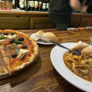 Maxi pizza and Bolognese.