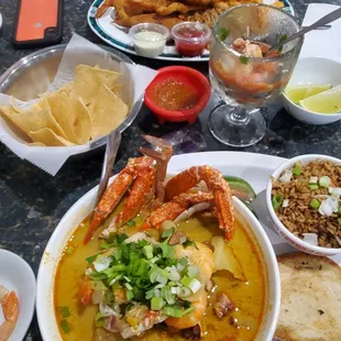 Fried shrimp and fish platter (top) Mariscada (bottom) Large Seafood Cocktail in the middle