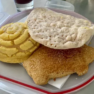 Concha, puerquito and (name?). Not too dry or sweet at all. Yum.