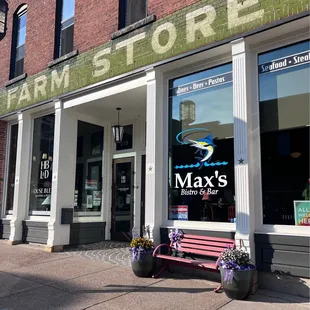 a bench in front of a store