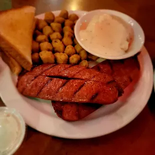 Hot link dinner with mashed potatoes and fried okra.. must get Jack Daniel's sauce