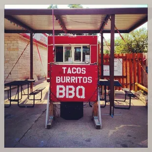 Max's kitchen is located to the right of Exxon station.