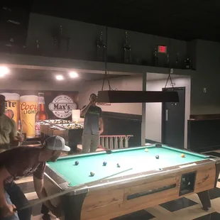 a pool table with a pool ball on it