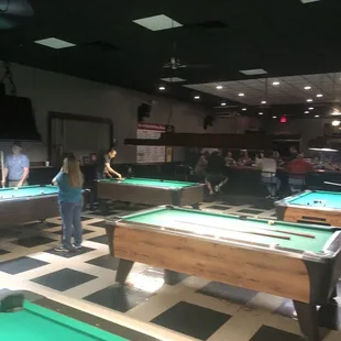 people playing pool