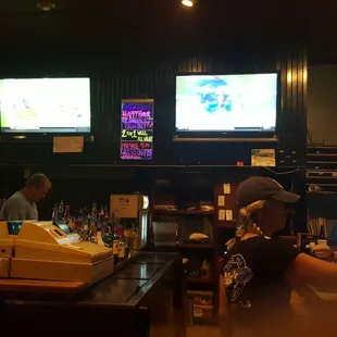 Behind the bar.