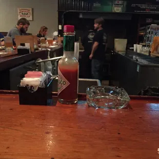 a bar with people in the background