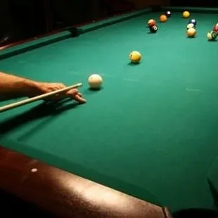 a man playing pool