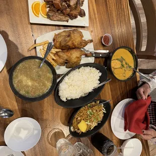 Lechon Kawali, Max&apos;s Pigeon, Kare Kare, Egg Drop soup, and pancit.