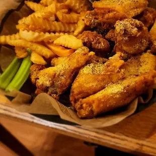 Lemon chicken wings with fries