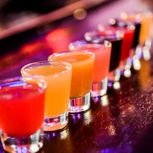 a row of shots on a bar
