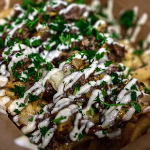 a close up of a box of fries
