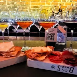 a variety of wine glasses and food
