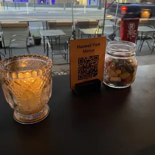 two glasses of beer and a qr code