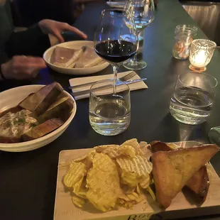 Truffle grilled cheese (bottom), fresh burrata (left), crunch wrap supreme (top dish)