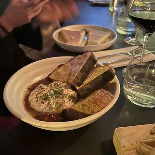fresh burrata (bottom) and crunch wrap supreme (top)