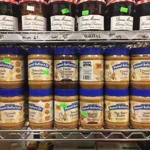 a shelf of peanut butter