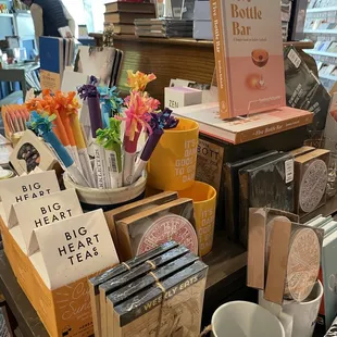 Gifts, cards, notebooks, stickers, pens, mugs, etc
