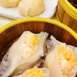 steamed dumplings in a bamboo basket