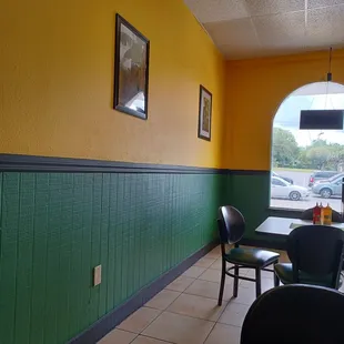 a table and chairs in a restaurant