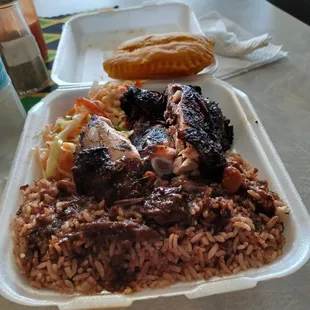 Jerk chicken lunch special with a beef patty.