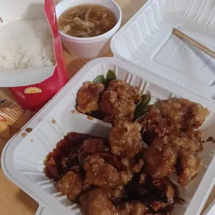 Delicious orange chicken. I added some dried red chilies. Hot and sour soup. Ample portion white rice. All perfect. :)