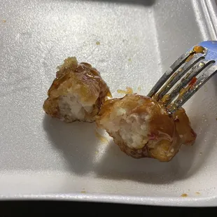 See the chicken in the center but the thick breading surrounding it making up the entire piece