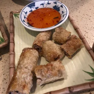 Two Vietnamese egg rolls. Not fresh. Hot but very hard.