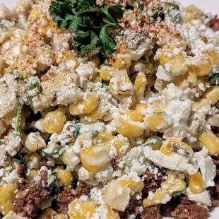 Esquiles Street corn with chorizo and served with homemade chips