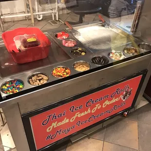 Ice cream cart, and this isn&apos;t all the toppings he has. He&apos;s got sauces, nuts, cookies and candies too!