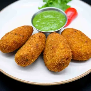 a plate of fried chicken nuggies