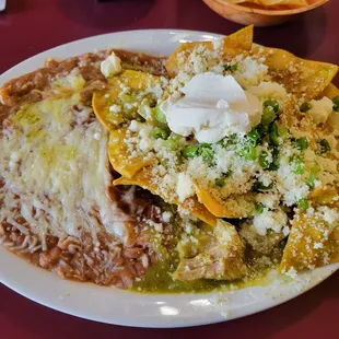 Chilaquiles Verde with Chile Verde on top