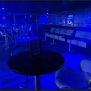 a bar with blue lighting