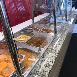 a buffet with a variety of food items