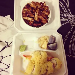 a meal in a styrofoam container