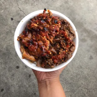 Chicken/beef bowl after I smothered it in teriyaki and chili sauce :)